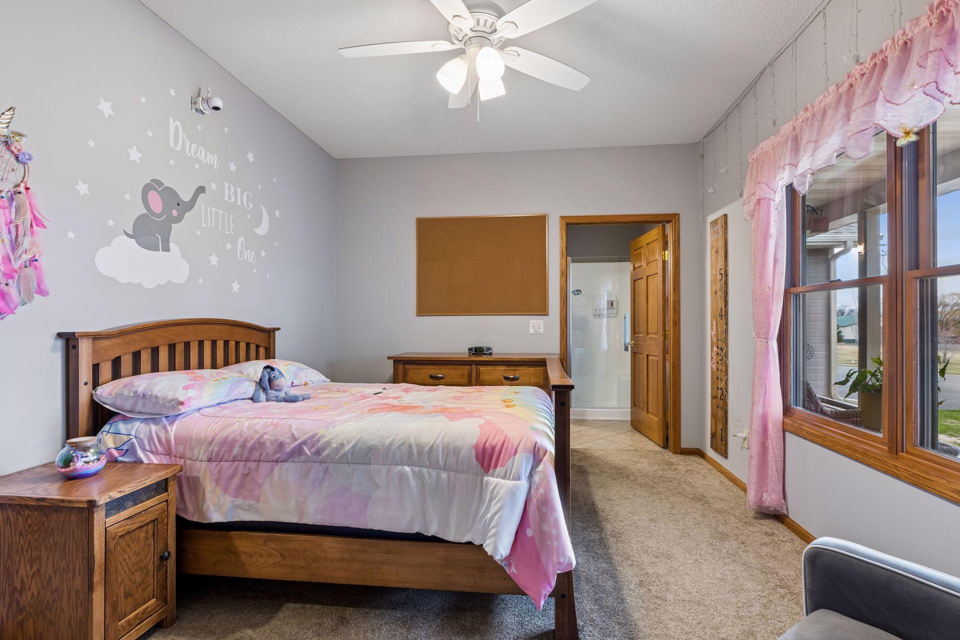 2nd main-level bedroom has walk-through bathroom suite