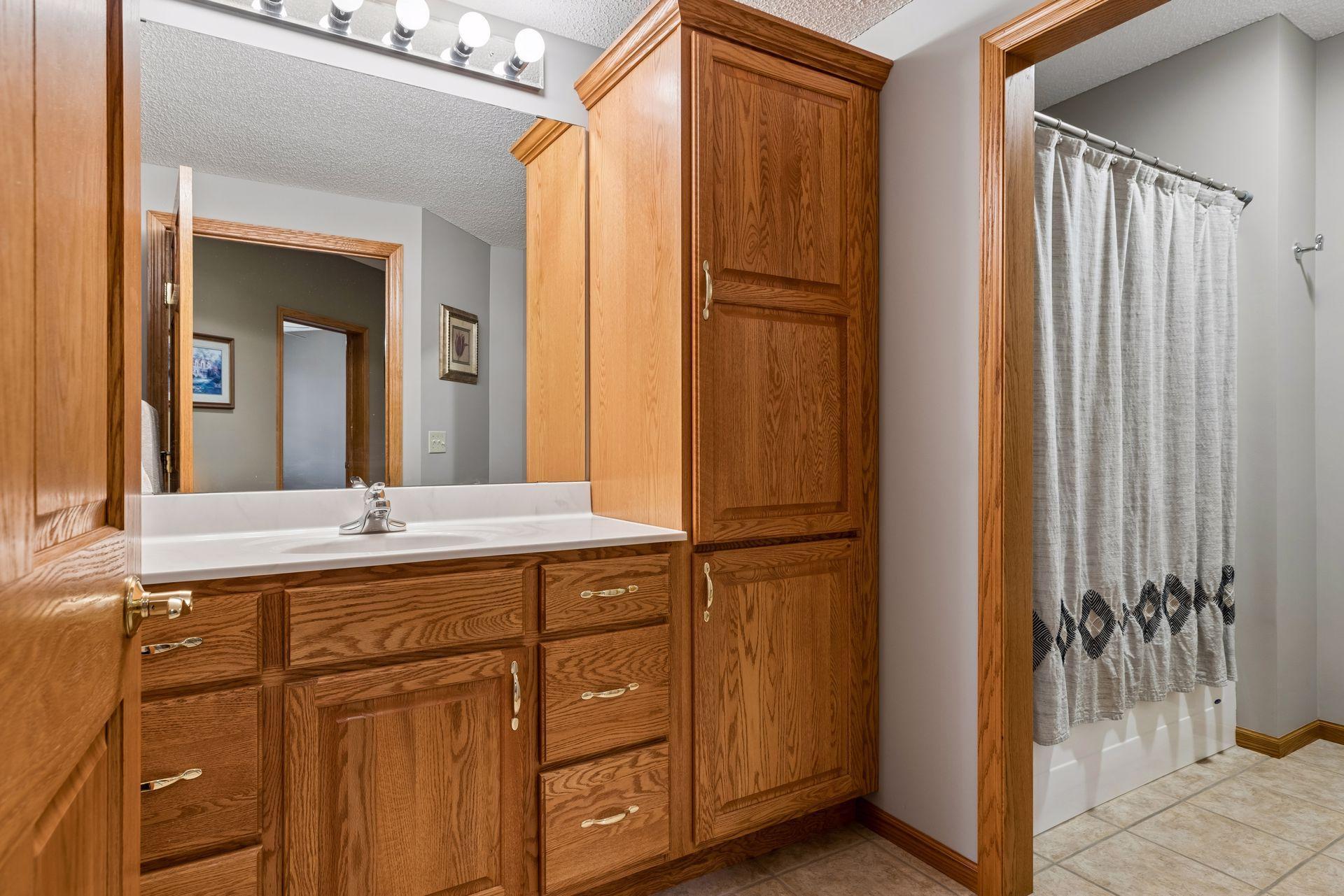 Spacious full bathroom located in lower-level