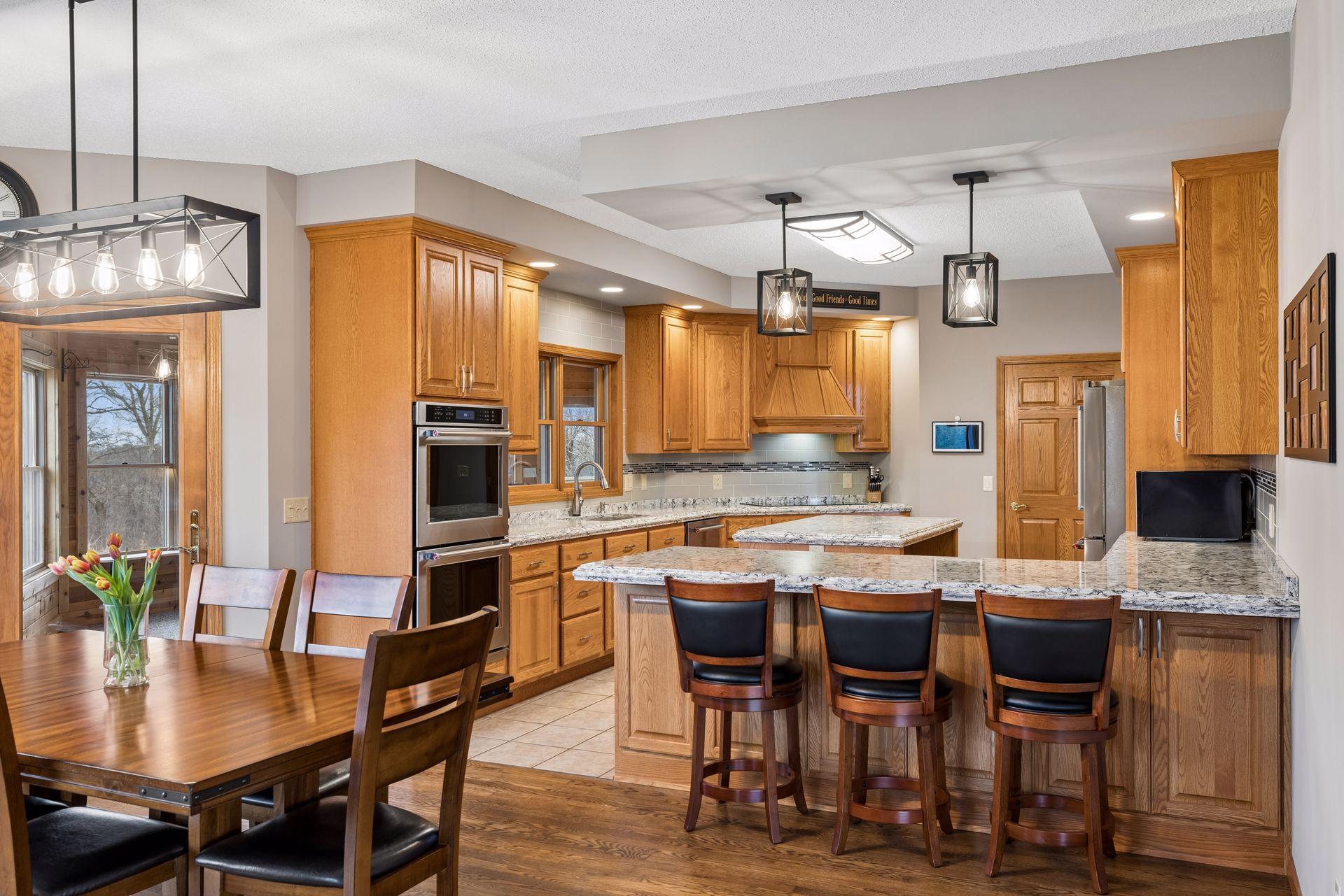 Spacious kitchen with large peninsula and center island