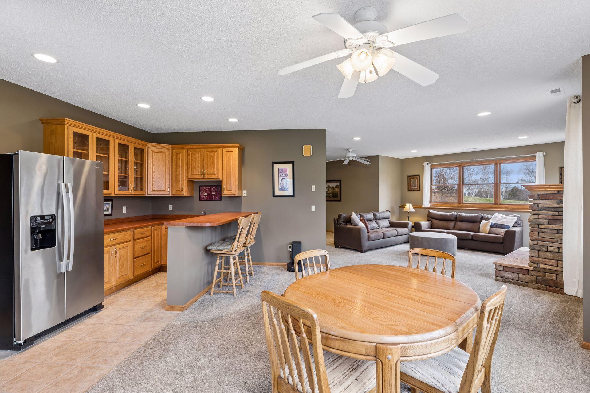 Wet bar in lower-level with refrigerator and snack bar
