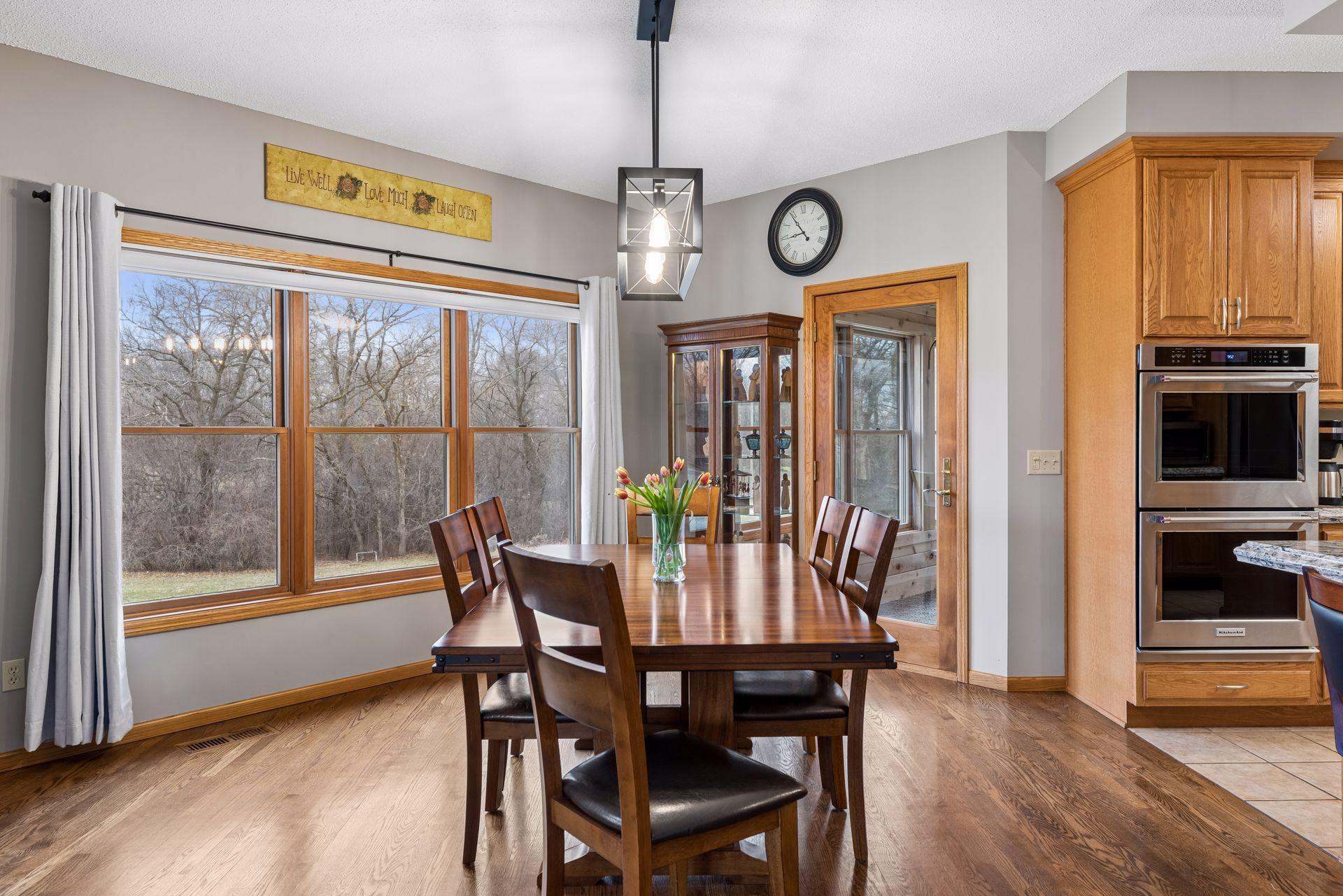 Informal dining off the kitchen with access to 3-season porch