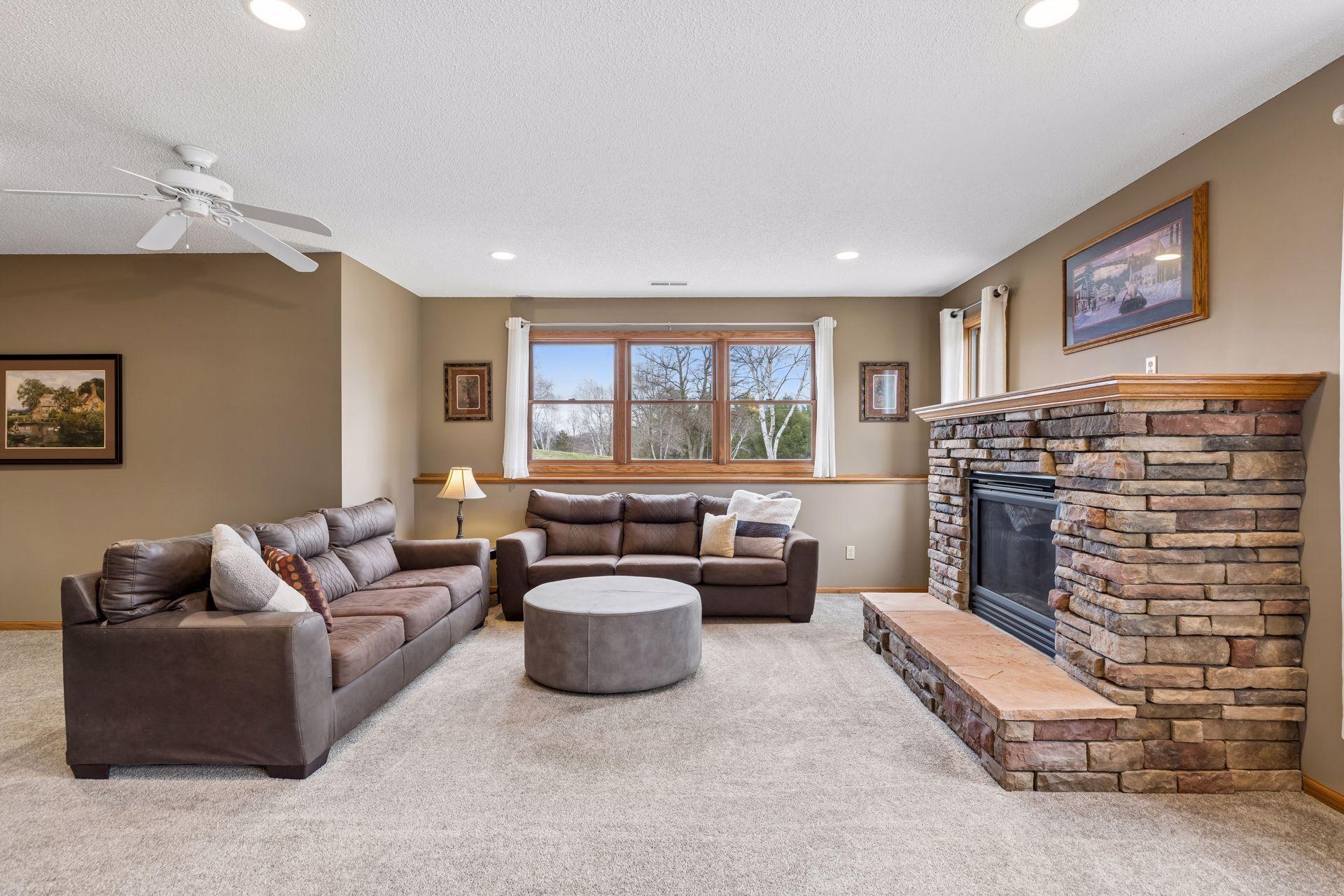 Kick back in the lower level family room by the fireplace
