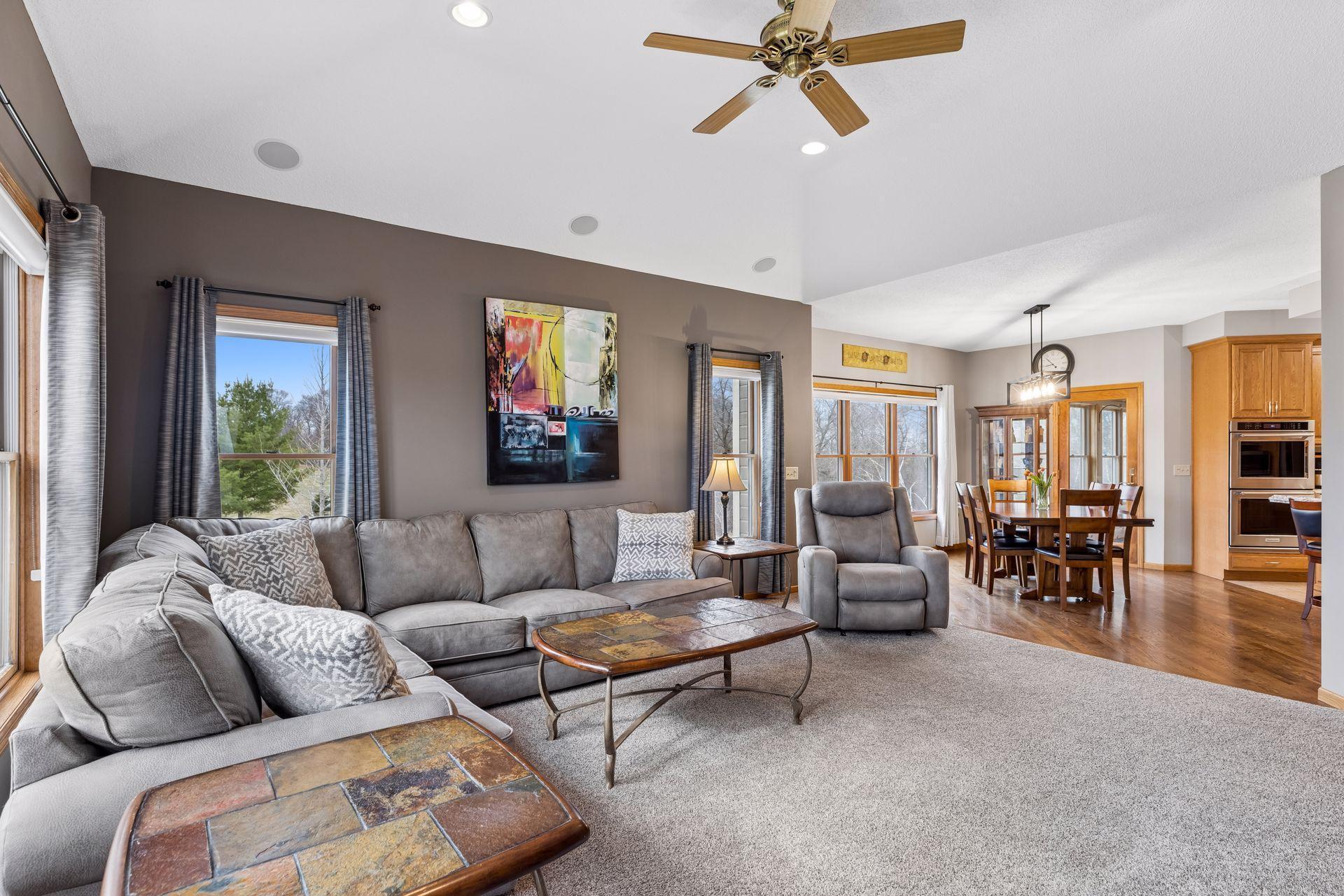 Living room is adjacent to dining room and kitchen