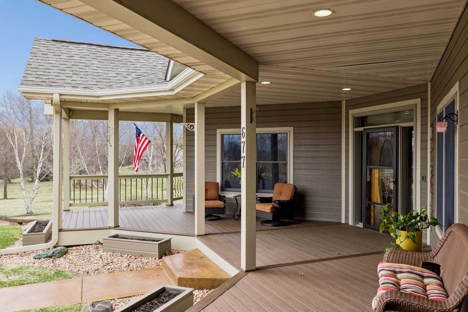Kick back on the expansive covered porch with newer maintenance free decking