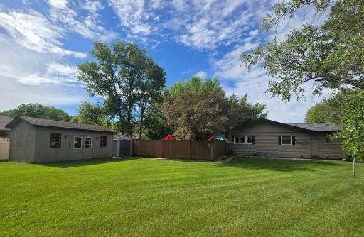 Southside of house, pool shed & utility shed