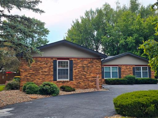 This ranch style home has stunning brick exterior, double attached garage with private backyard pool.