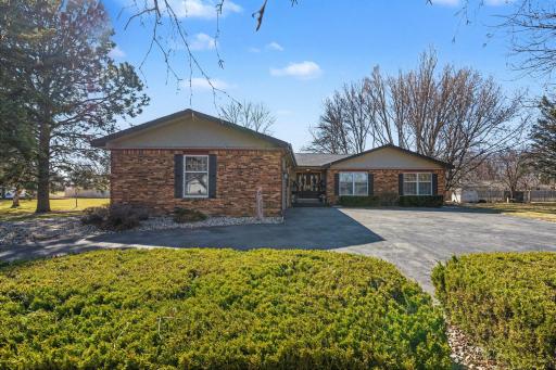 You will love the convenience of the drive in and out asphalt driveway!