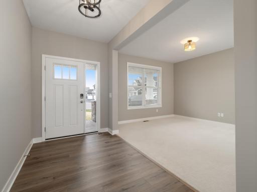 Front door and flex room to the right. Could be a home office, library or as a future 5th bedroom.