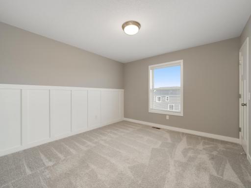 This upper level bedroom has northern exposure.