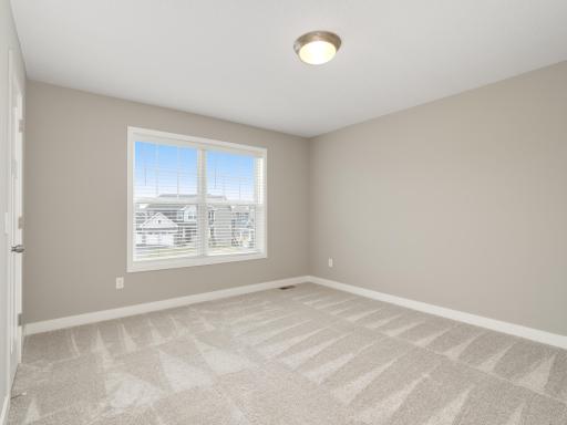 Upper floor bedroom with south facing exposure.