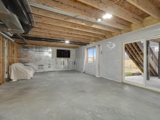 The lower level is a walk-out to the rear patio and backyard. The large windows allow lots of natural light in and never feels like a typical basement.
