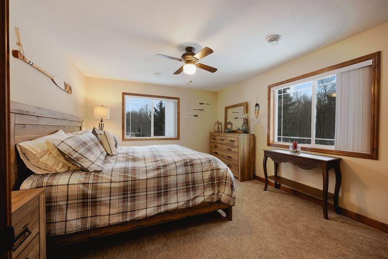 One of four large upper level bedrooms.