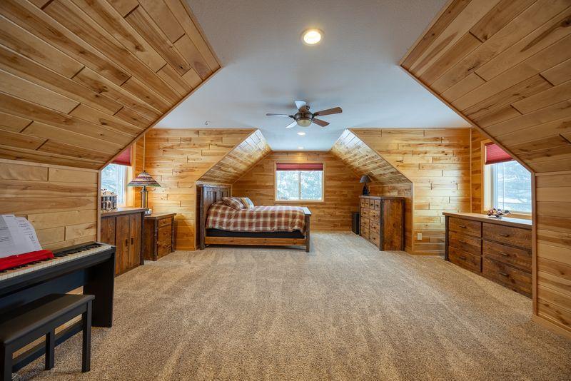 This bonus room above the garage has many possible uses, game room, family room, or a sixth bedroom.