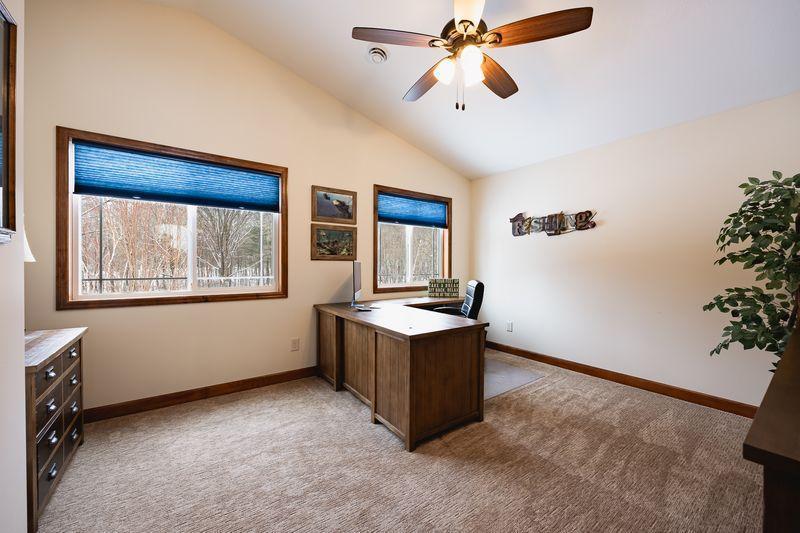 Upper level bedroom currently used as an office.