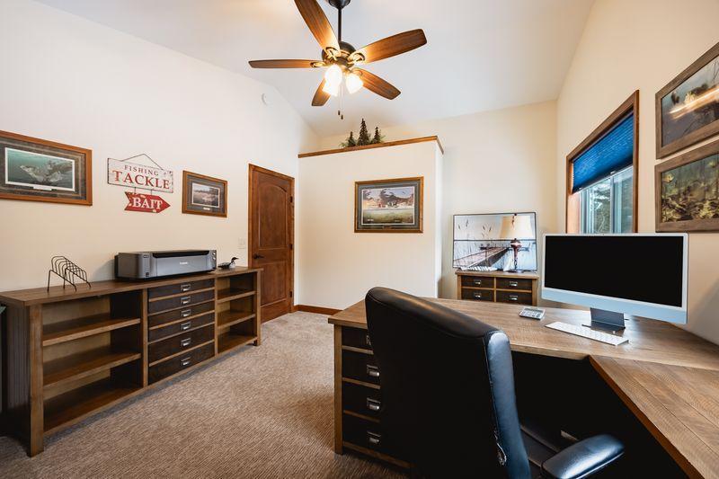 Upper level bedroom currently used as an office.
