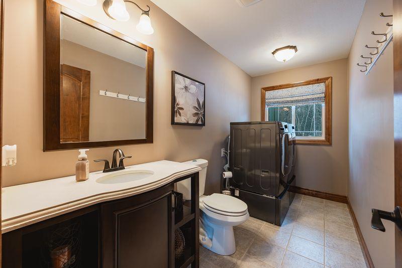 Main floor half bath and laundry.