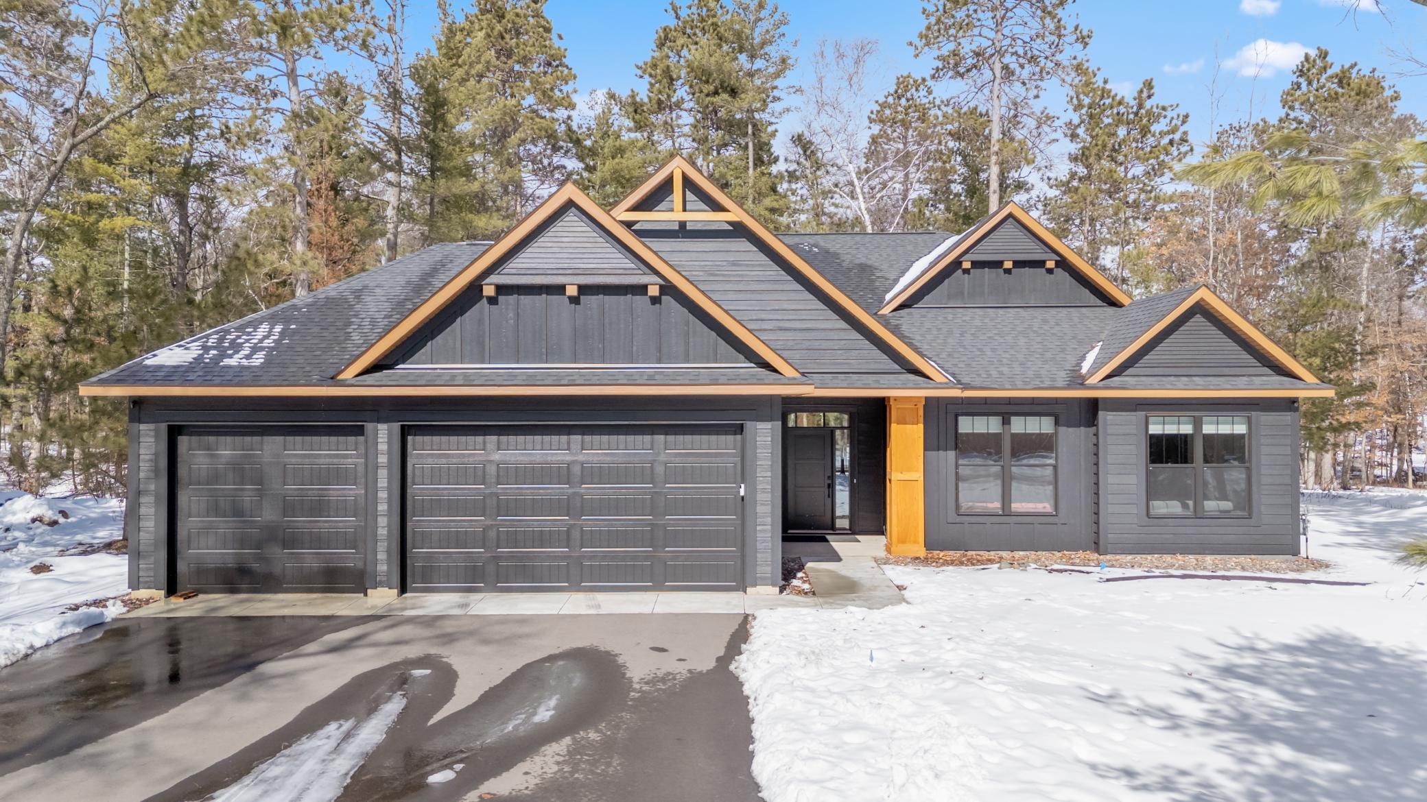 Welcome to 11956 Harbor Lane. This turn-key home built in 2024 is ready for your dream summer on the Whitefish Chain of Lakes!