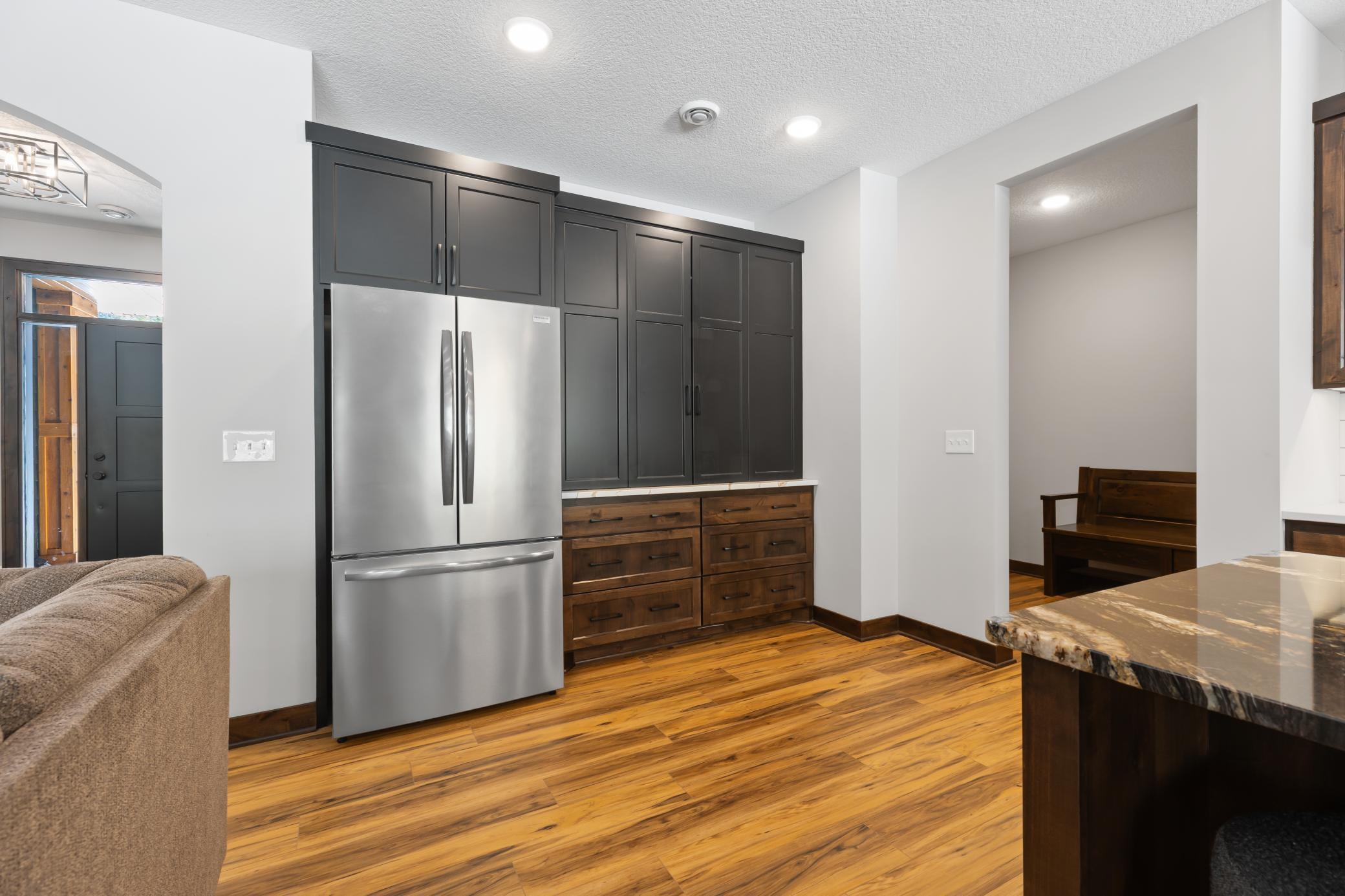 The custom built-in cabinetry doesn't only offer sleek design...