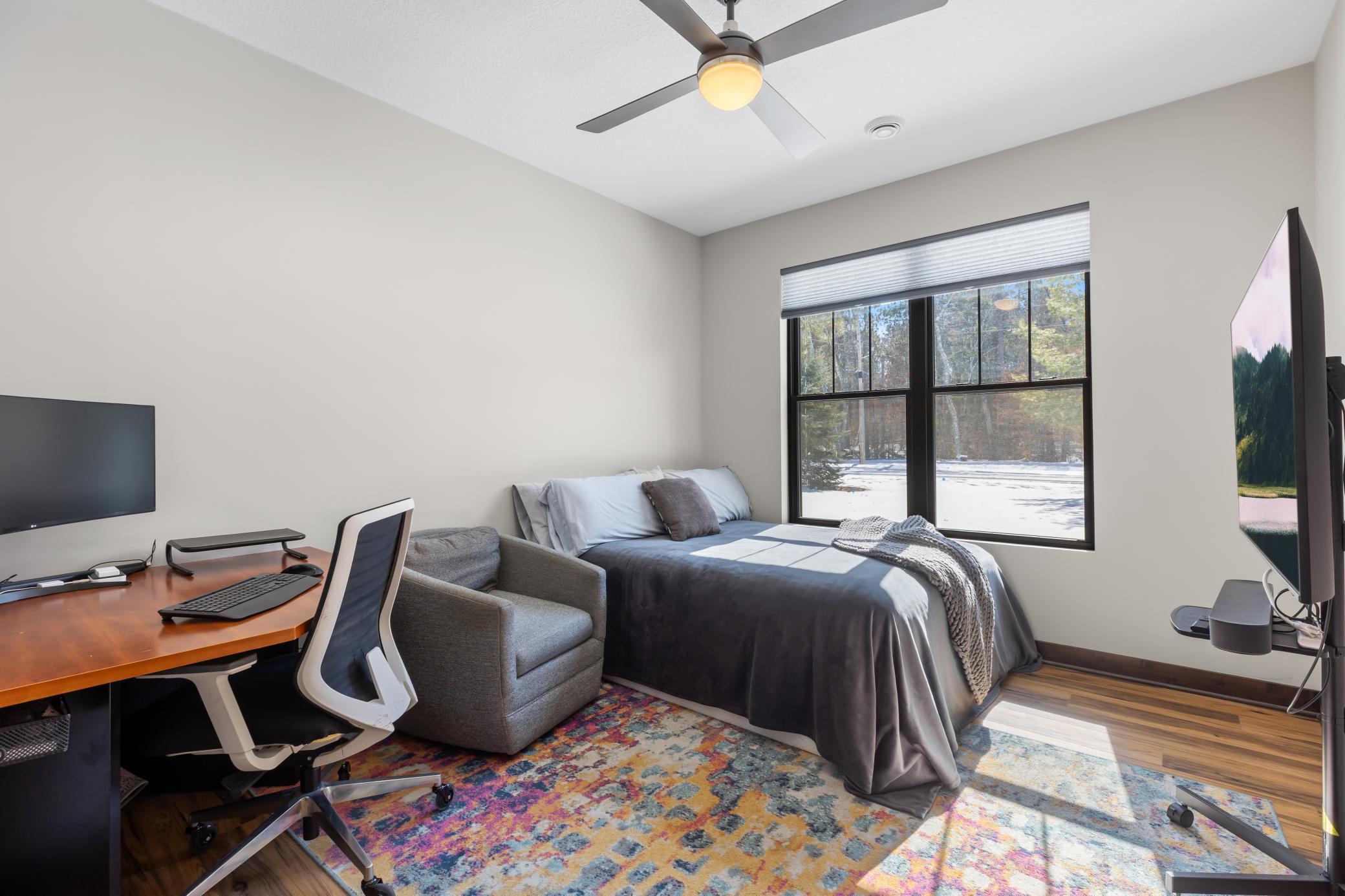 Ideal for hosting overnight visitors or working from home, this adaptable third bedroom offers both comfort and convenience.