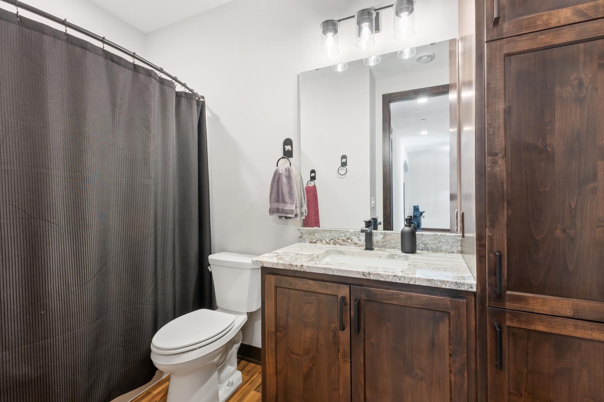 A separate full bath is conveniently located near the second bedroom, ideal for guest use!