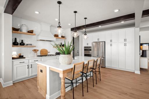 The spacious gourmet kitchen is the centerpiece of this home. Perfect for the gourmet chef or the entertainer! (model photo)