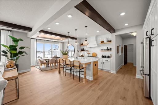 The main floor is perfectly designed to be interactive and have an abundance of natural light. (model photo)