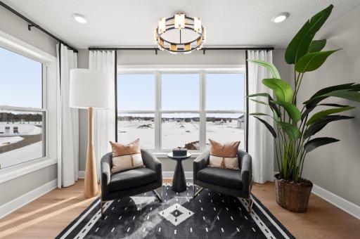 The sitting room off the owner's suite is perfect to enjoy morning yoga, a cup of coffee or a quiet space to settle down with a good book. (model photo)