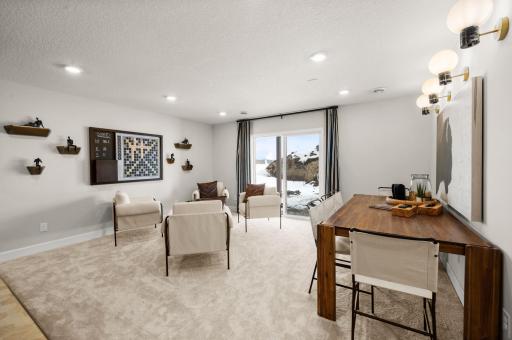 Another view of the lower level rec room. (model photo)