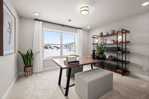 The lower level bedroom is perfect for guests but also makes for a quiet office space. (model photo)