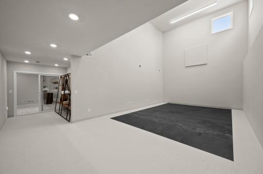 WOW, what great space! The athletic court is perfect for getting some activity year round and connects seamlessly to the exercise room for even more functional fitness activities. (model photo)