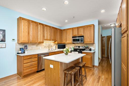 Look where the stairs are located to go up. What an extremely well-thought-out feature that gives it a high-end spacious feel!