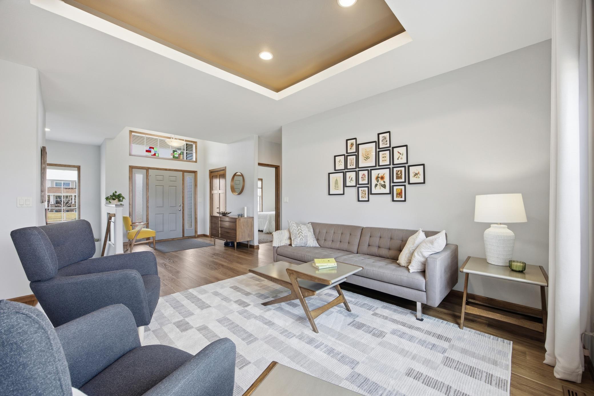 Raised outlet for TV is located behind frames