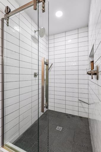 Primary Walk-in Shower: Model Home Image- some optional finishes may be pictured