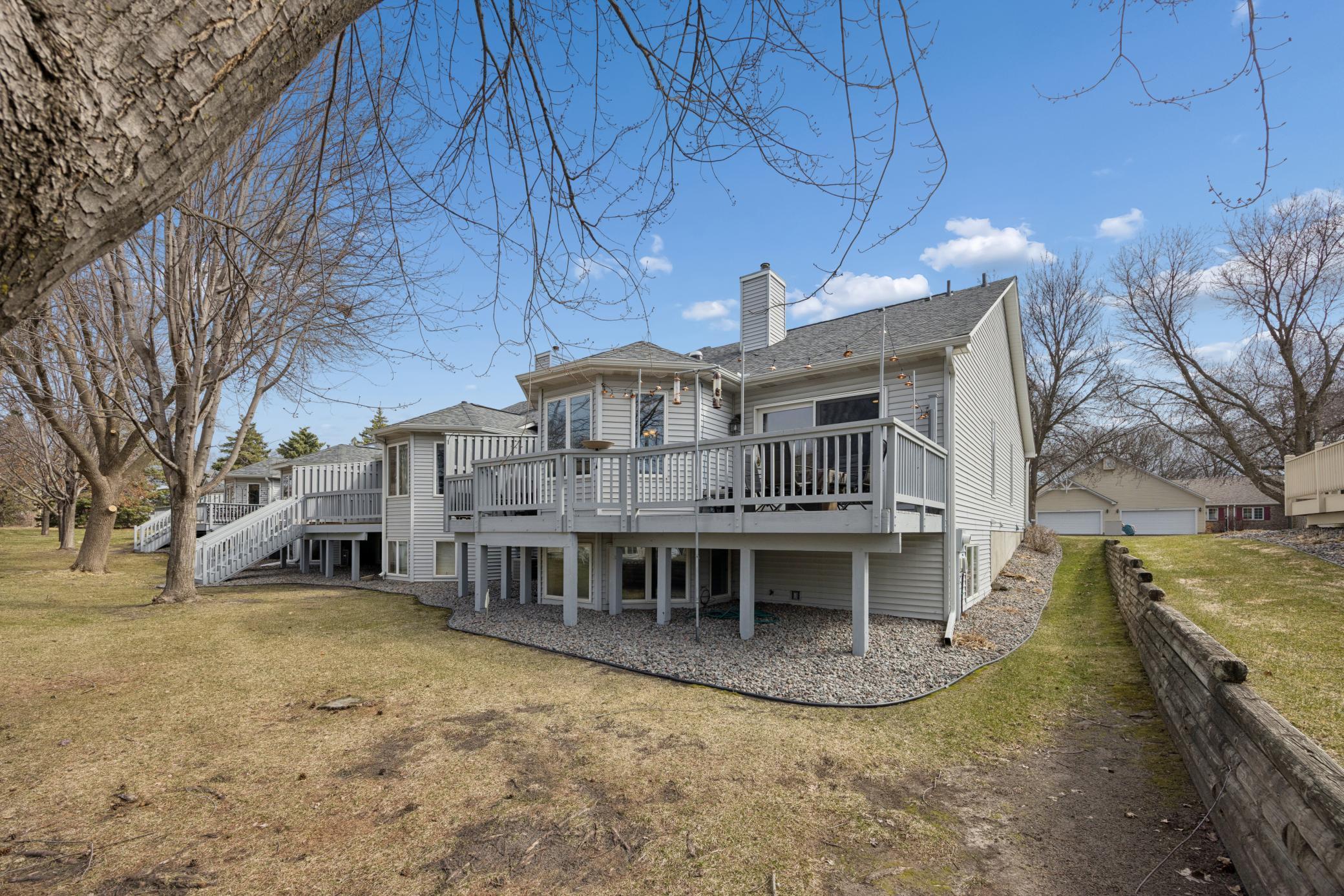 Back of the home shows the bayed rooms up and down