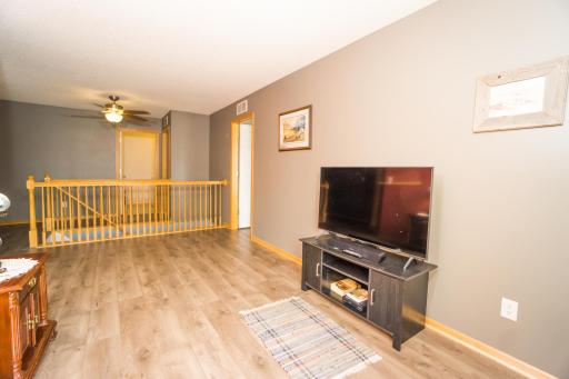 Upper level family room with newer flooring