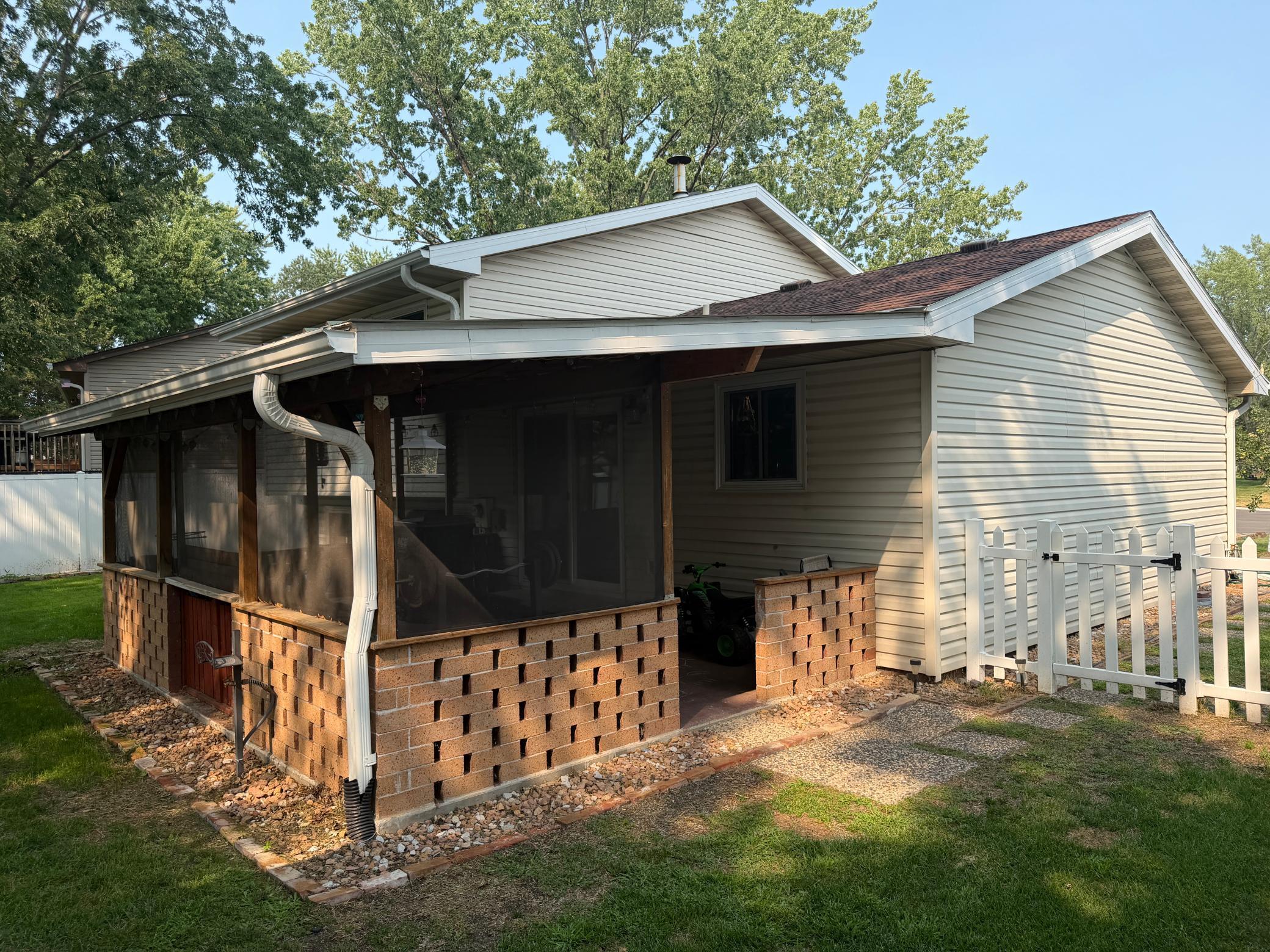 back of house with covered patio