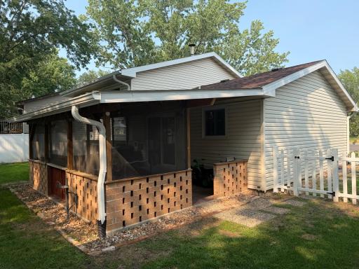 back of house with covered patio