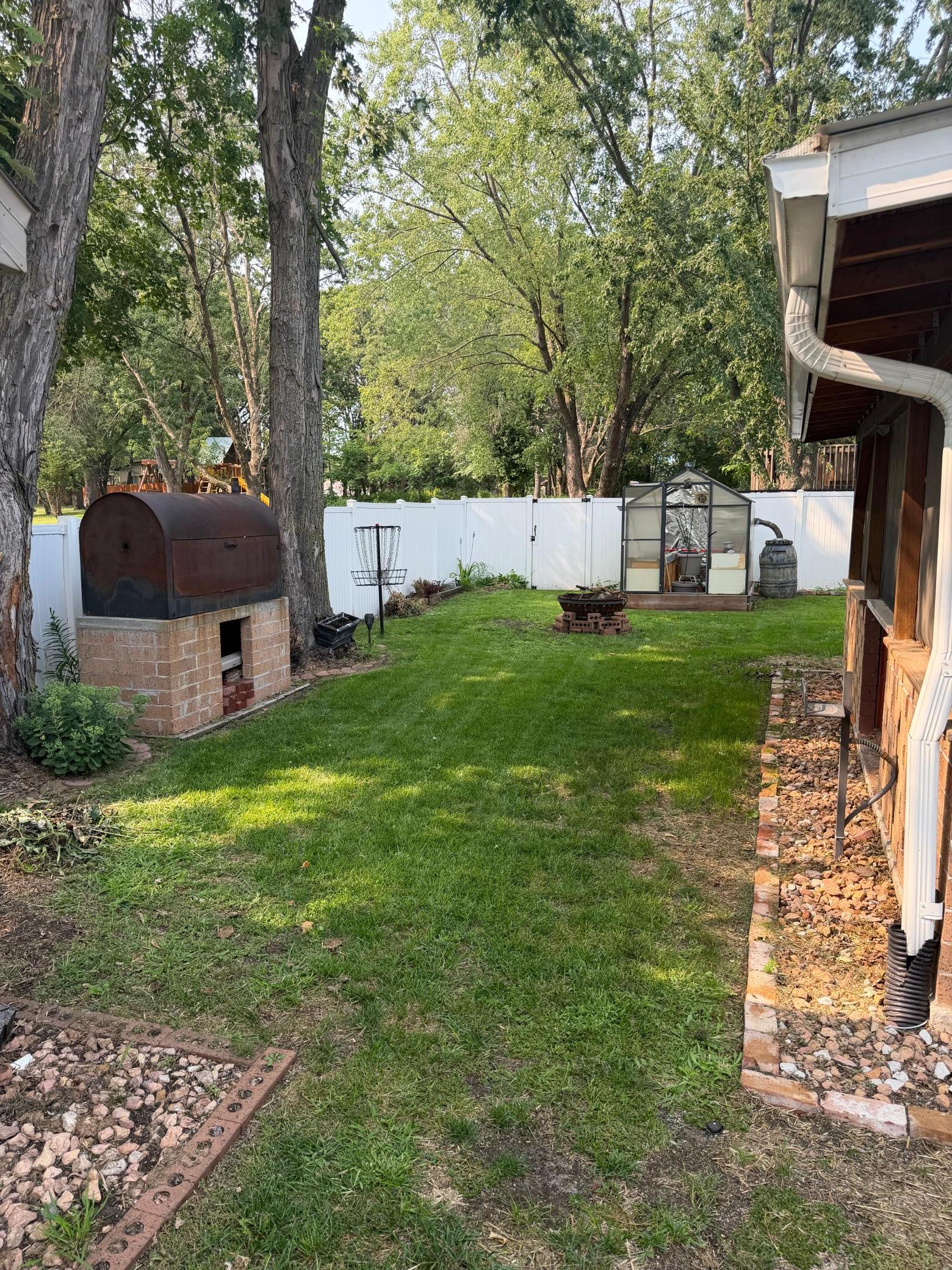 greenhouse and wood burning roasting grill
