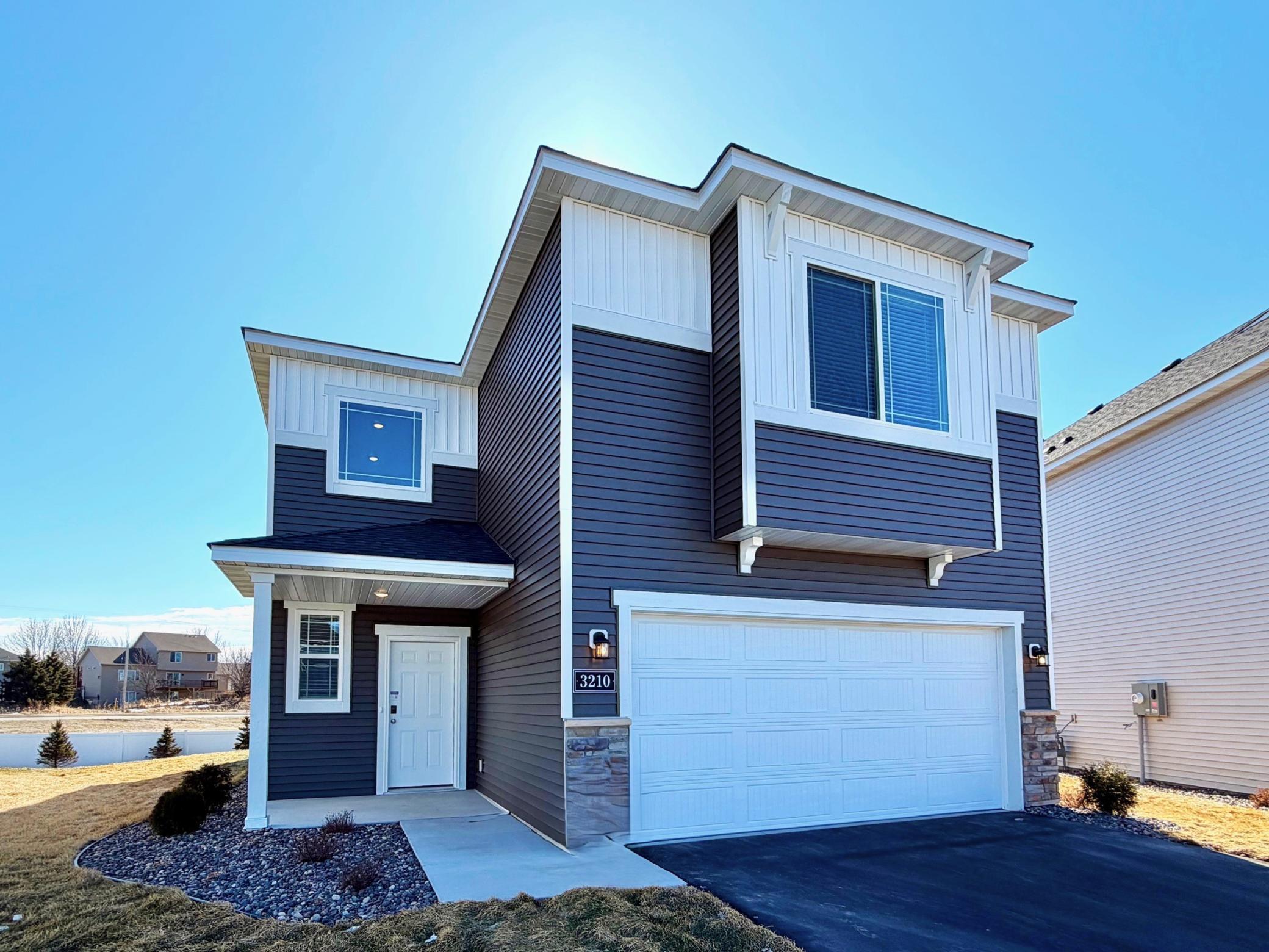 3210 Kady Ave NE- Home is ready for a Quick Move-in! Highlights include a main floor flex room located on a Cul-De-Sac Homesite!