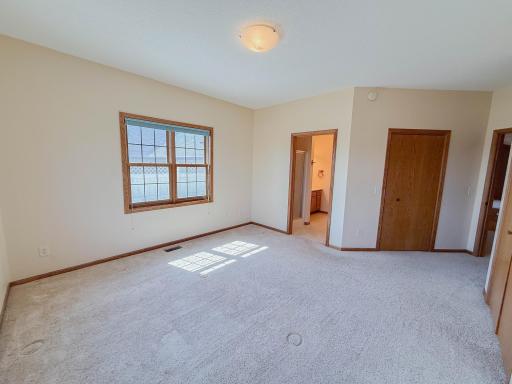 Primary Bedroom with Walk In closet and ensuite bathroom