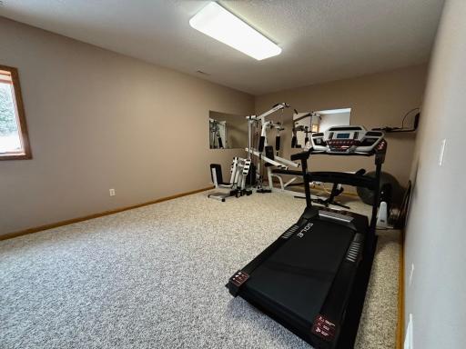 Dedicated space perfect for exercise or a home gym.
