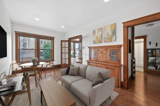 Virtually staged space to show how you could utilize space if you did not want to use Murphy bed.
