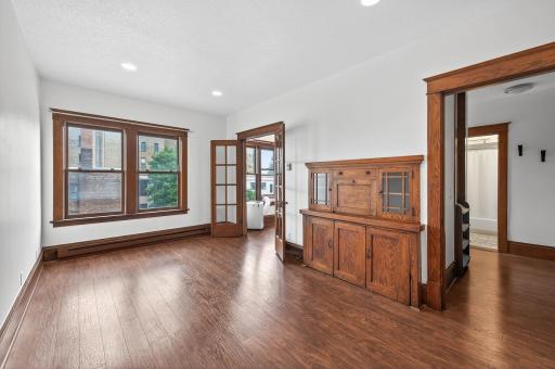 Living room/bedroom space. Includes a full-size Murphy bed to maximize this area!
