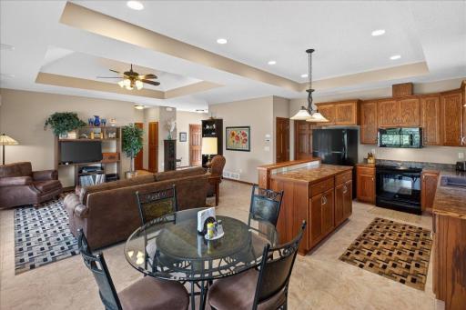 Open-concept layout connecting the kitchen, dining, and living areas — perfect for entertaining and comfortable everyday living.