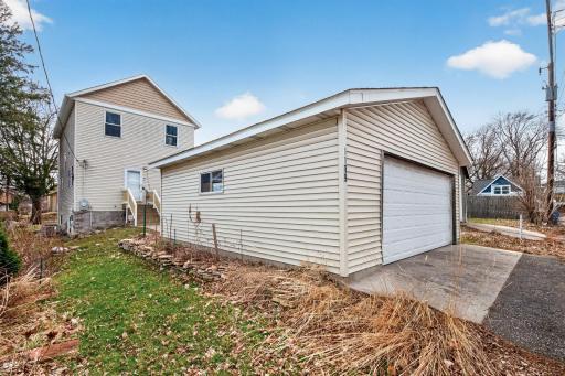 Spacious detached 2-car garage with no alley access, offering added privacy along with ample storage and convenient parking.