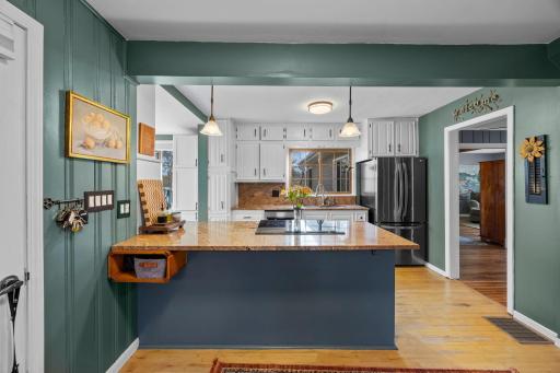 Kitchen with counter seating area