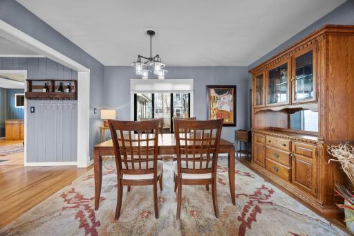 Dining room overlooks fenced yard