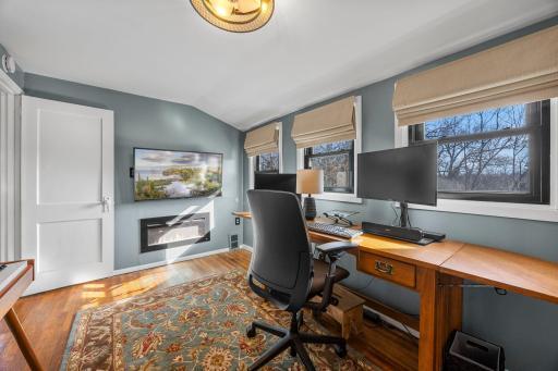 Note the electric fireplace added to this room