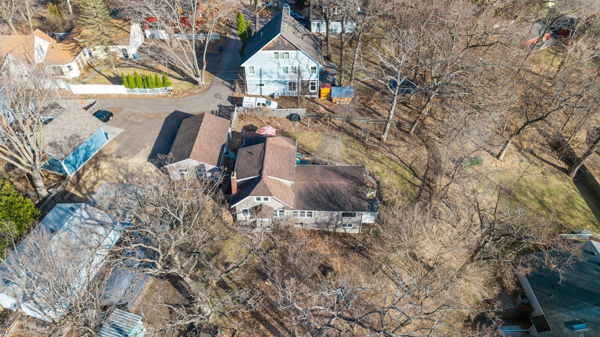 5441 Ridgeway aerial view of home, garage, and lot