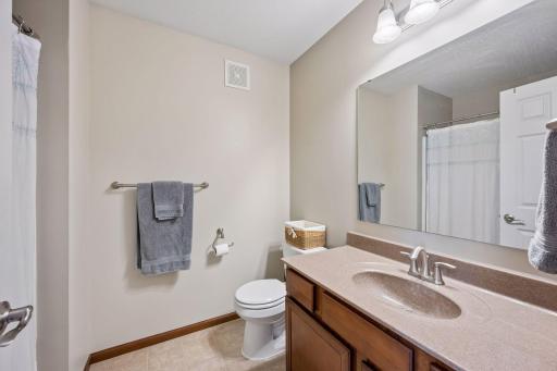 Upper level full bath serves the 2nd bedroom.